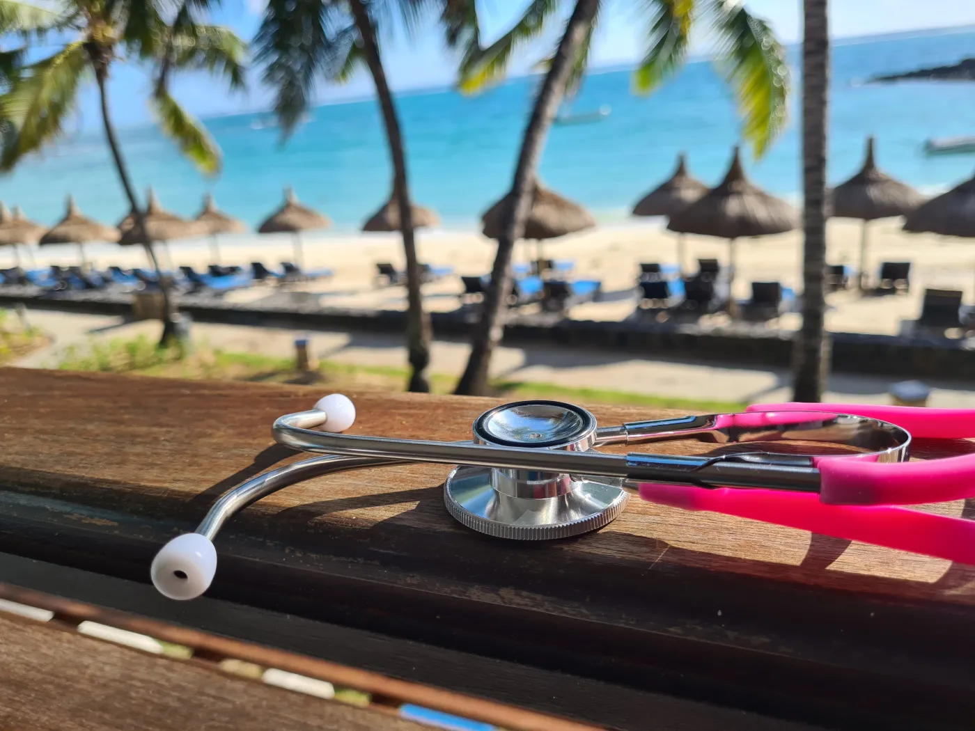 Medical,Stethoscope,On,Background,Of,Ocean,Sea,In,Tropics.,Medical