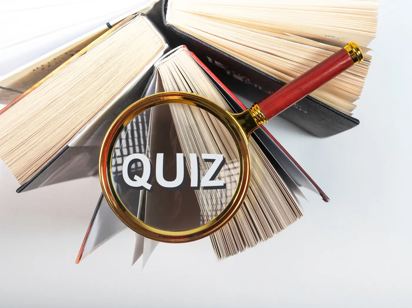 Word,Quiz,Through,Magnifying,Glass,On,Books.