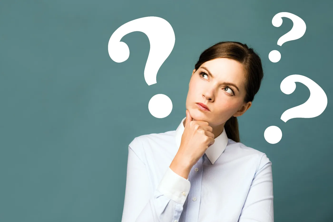 Young,Woman,With,Question,Marks.
