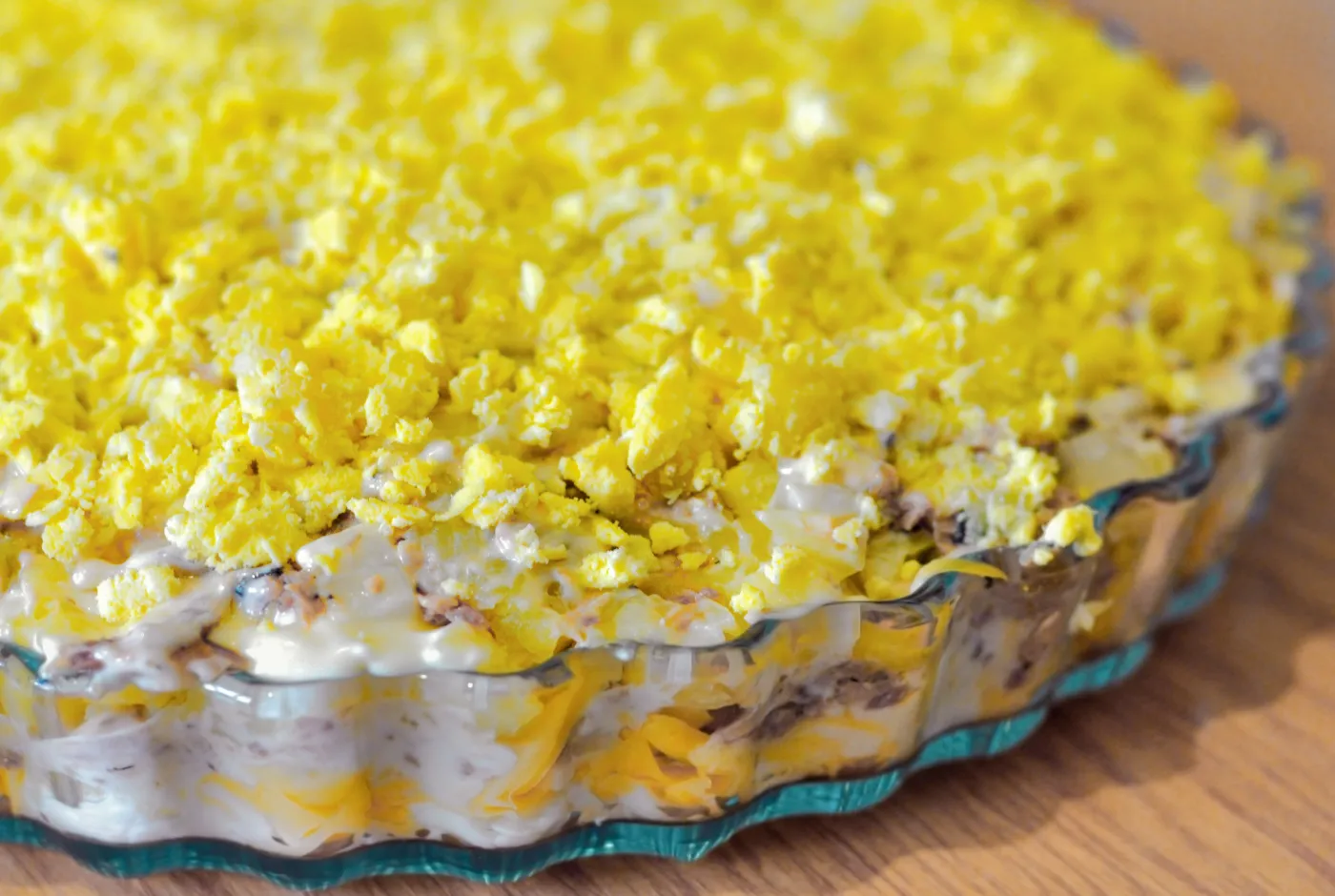 Russian,Traditional,Christmas,Salad,Mimoza,In,A,Round,Glass,Plate