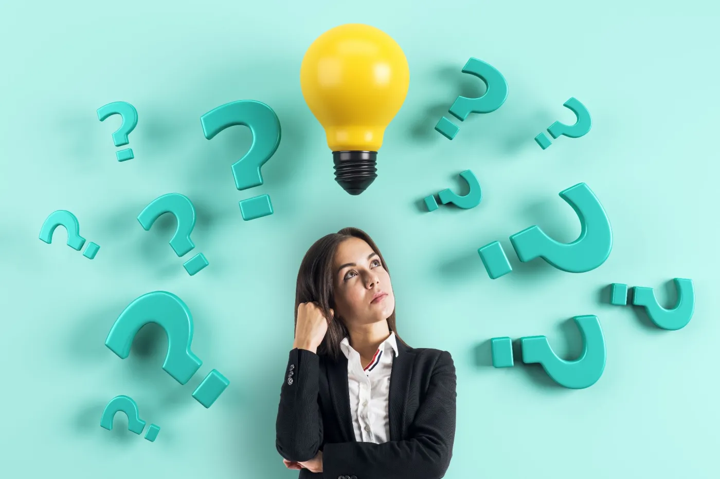 Woman,In,Business,Attire,Thinking,With,Question,Marks,And,A