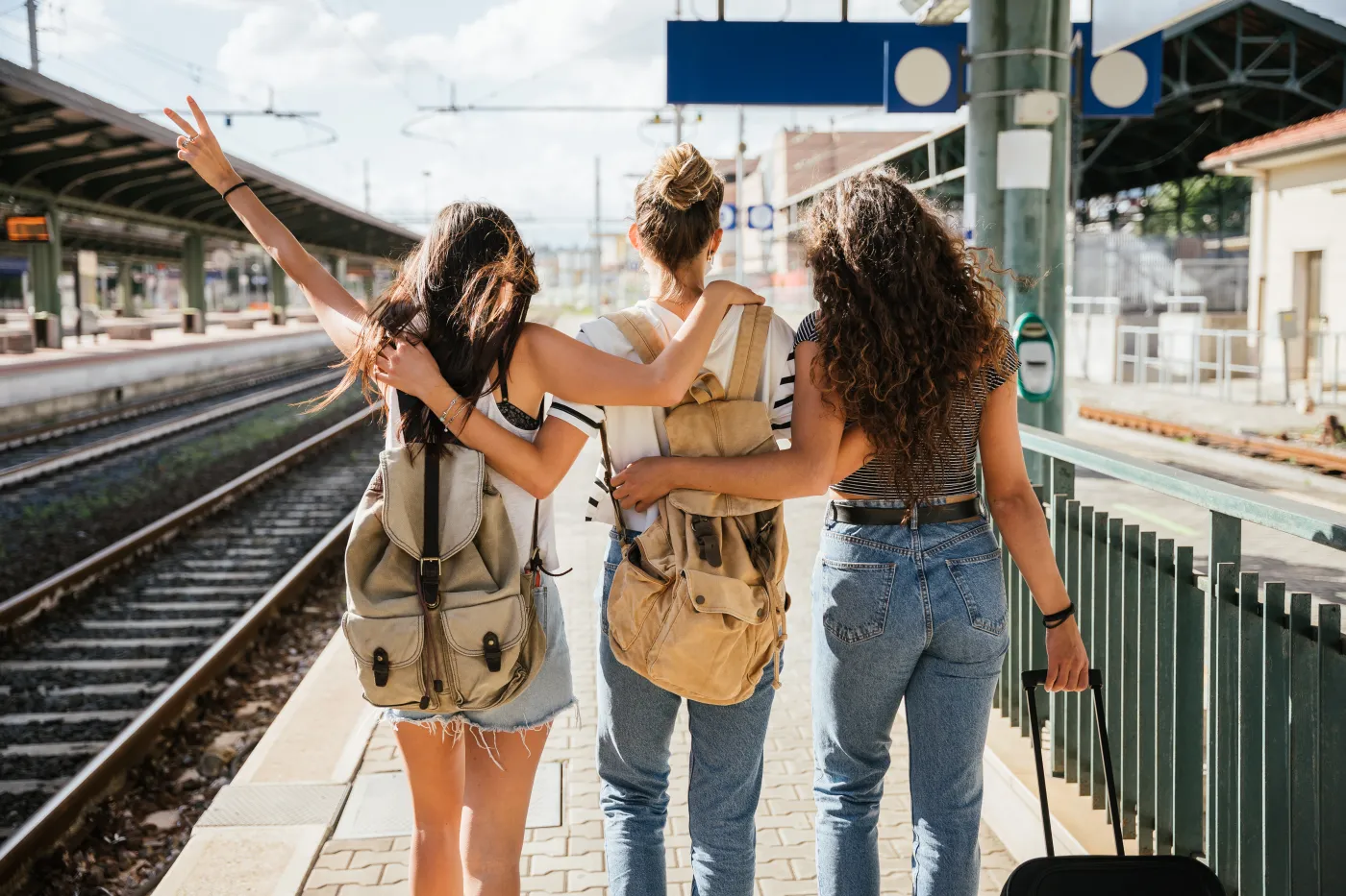 Three,Young,Beautiful,Female,Women,At,Station,To,Catch,Train