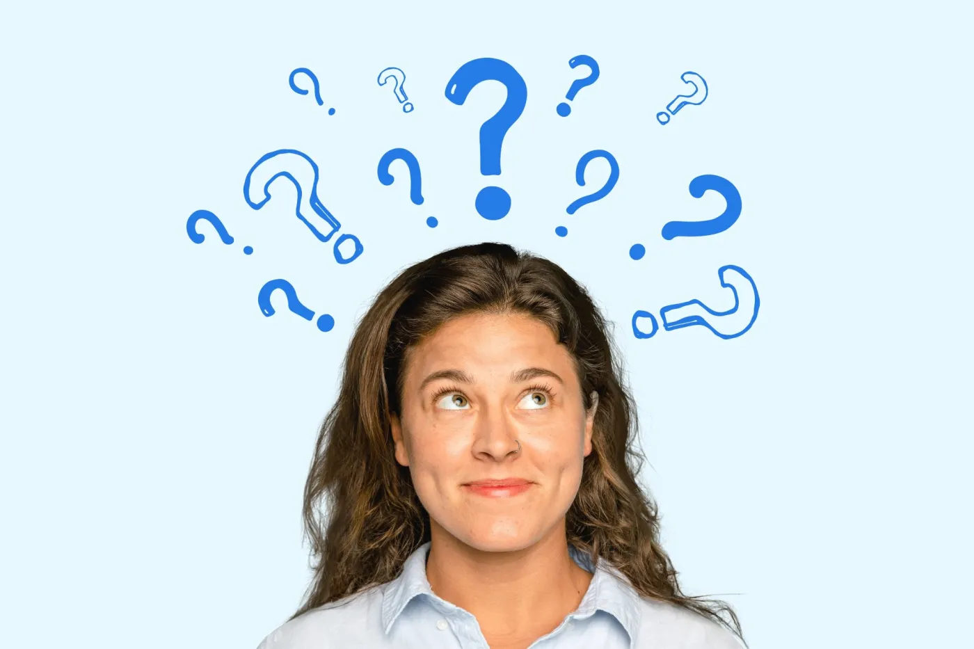 A,Woman,With,Long,Hair,Looks,Up,With,A,Curious