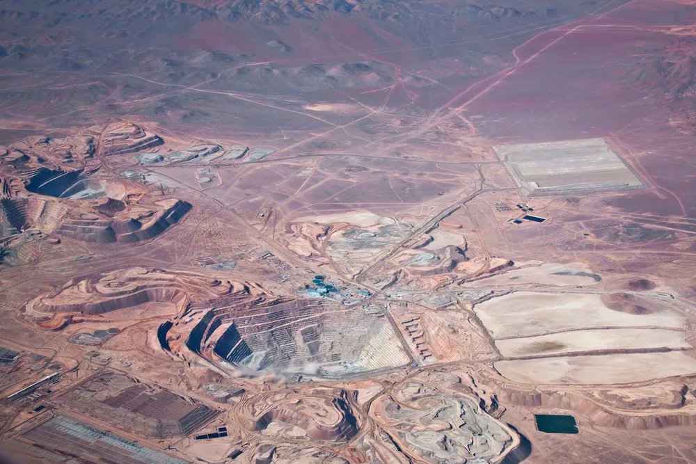 1210220-aerial-view-of-open-pit-copper-mine-in-atacama.jpg