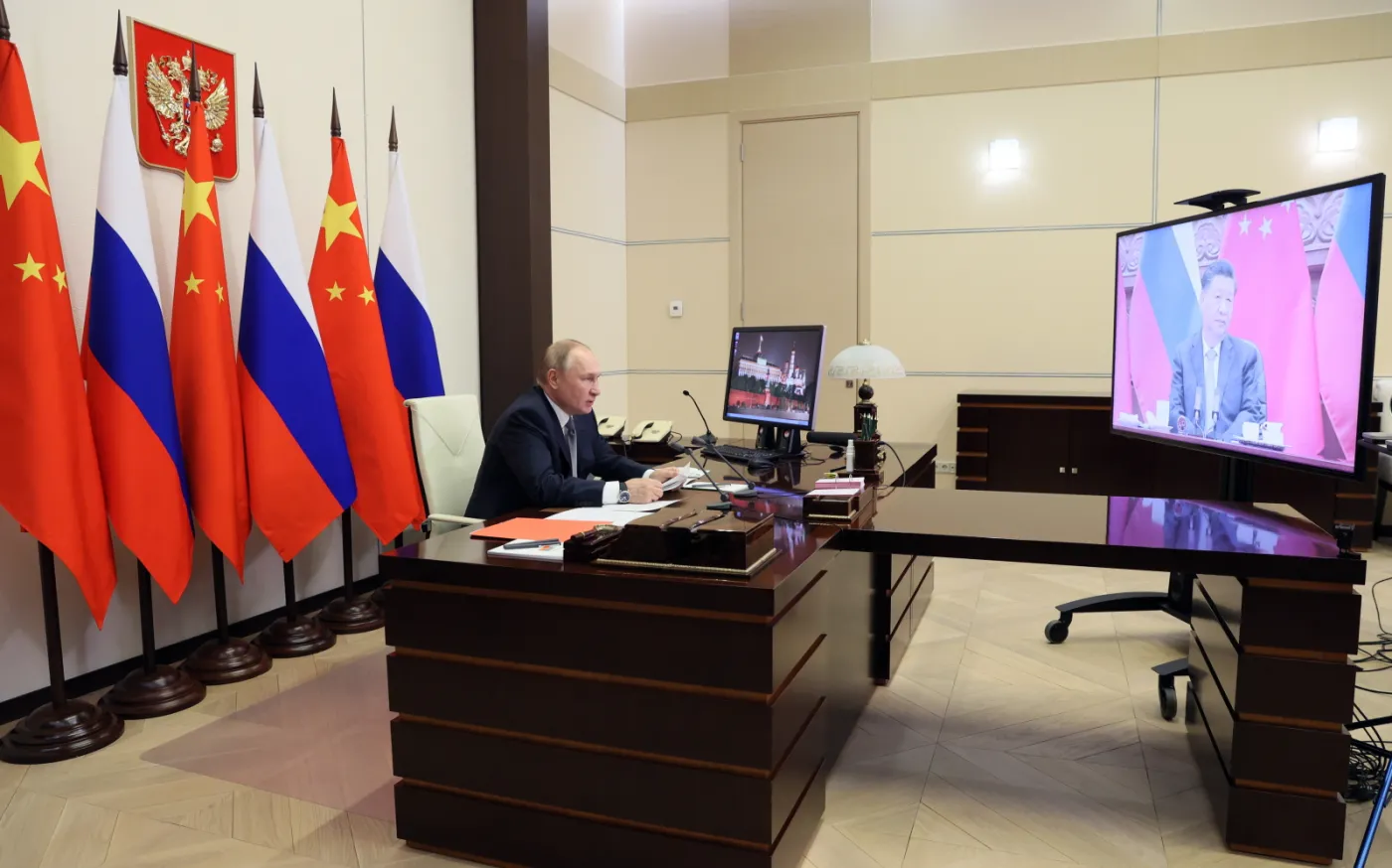 Russian President Vladimir Putin meets with Chinese President Xi Jinping