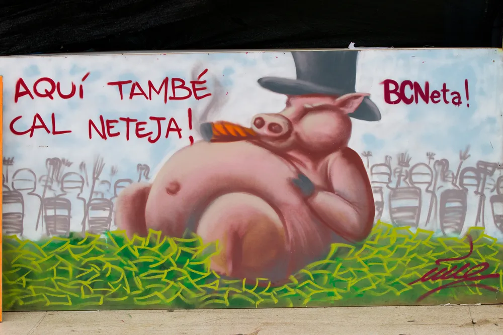 Hiszpanie nie chcą płacić za kryzys, który w ich mniemaniu spowodowały błędy bankierów. Na zdjęciu mural w Barcelonie. Fot. Anky / Shutterstock.com 