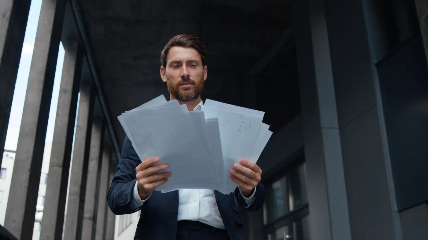 Successful,Happy,Caucasian,Mature,Business,Man,Holding,Papers,Walking,In