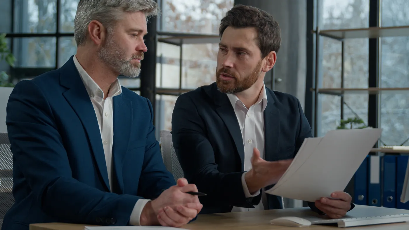 Caucasian,Men,Businessmen,Discussing,Agreement,Business,Documents,In,Office,Dissatisfied