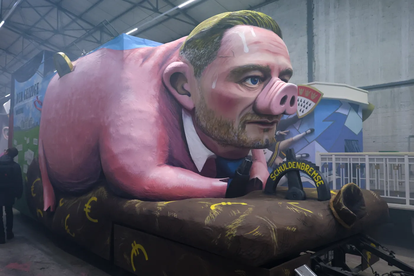 Niemiecki minister finansów Christian Lindner, karykatura, parada w Kolonii
