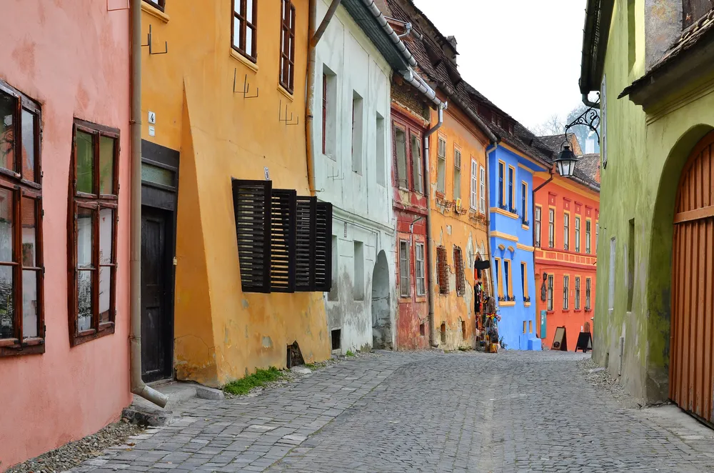 955366-medieval-street-view-in-sighisoara-transylvania.jpg