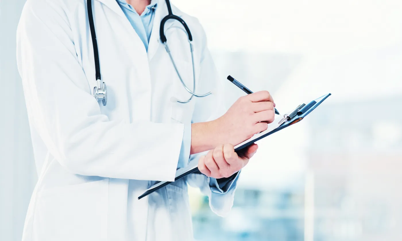 Hands,,Doctor,And,Clipboard,Writing,Notes,For,Hospital,Schedule,,History