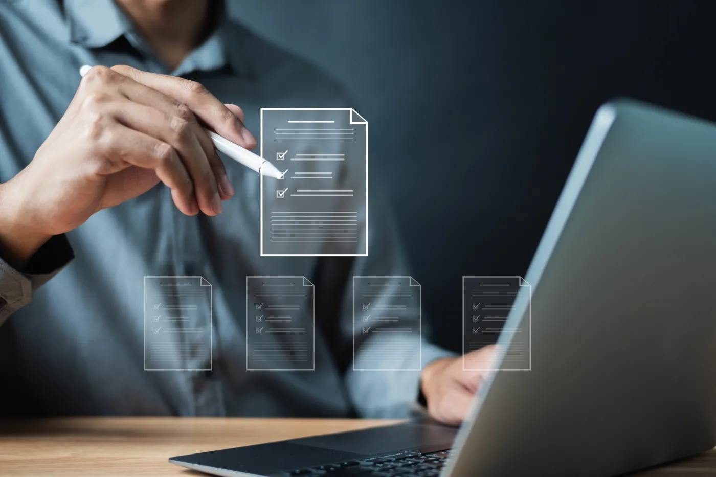 Businessman,Reviewing,Digital,Documents,With,Stylus,On,Laptop.,Perfect,For