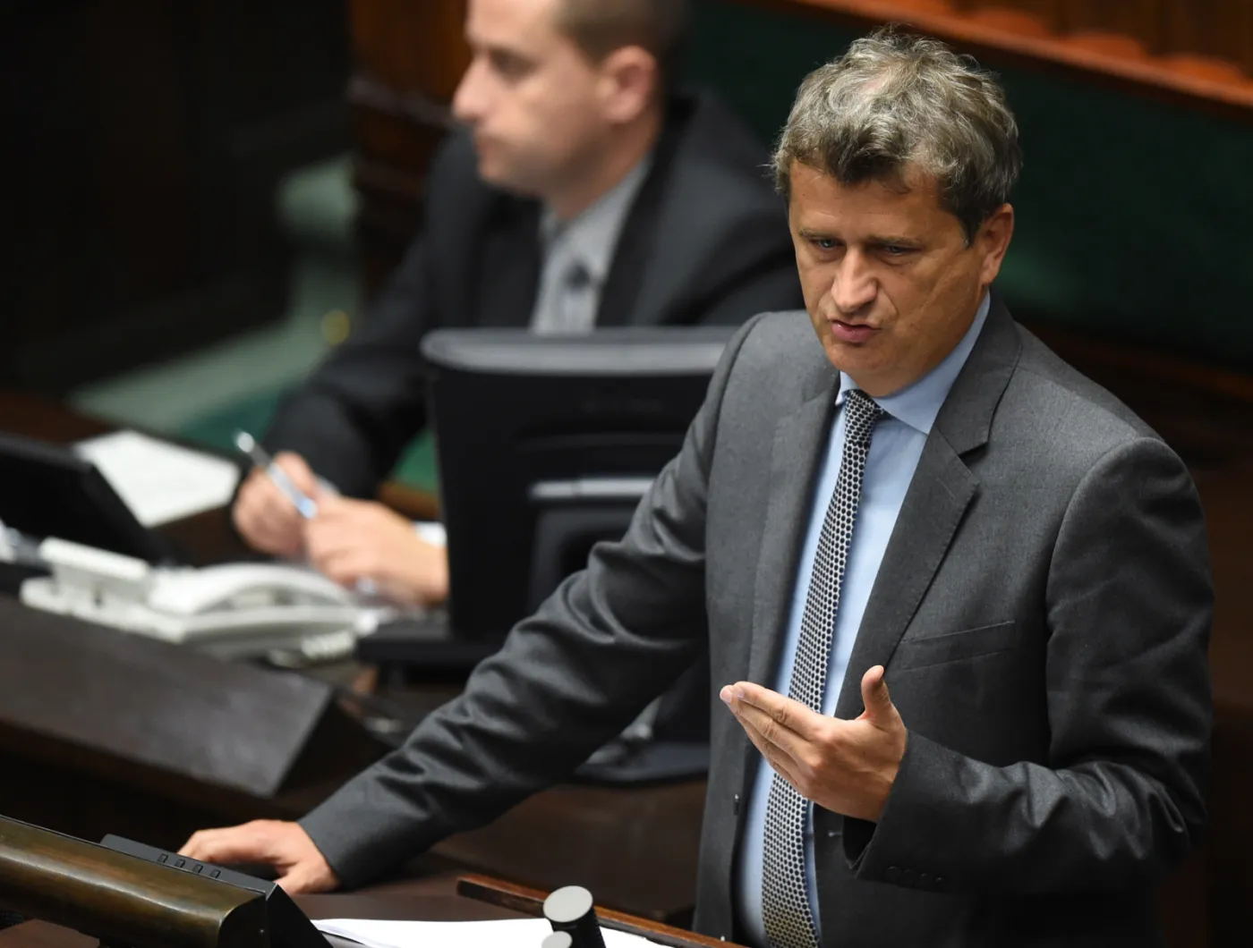 Janusz Palikot podczas debaty nad expose. Fot. PAP/Radek Pietruszka