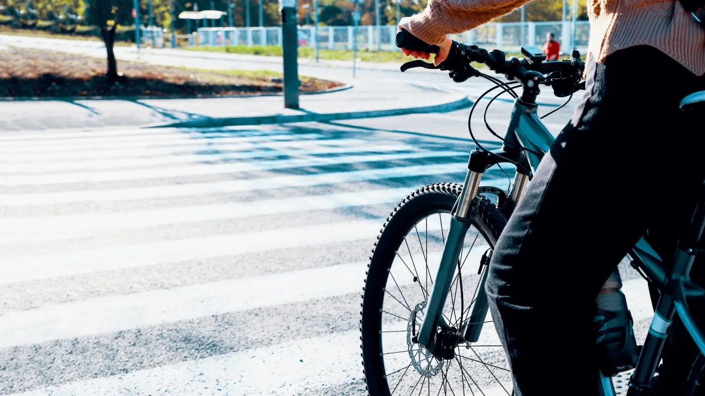 Woman,Cyclist,Crossing,Zebra,On,The,Street.,Female,Commuting,To