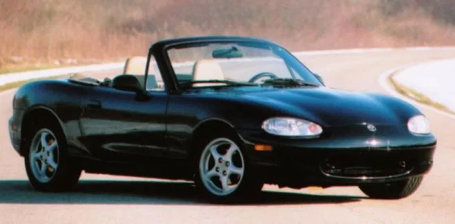 547817-miata-passenger-side-angle-shot-in-park.jpg