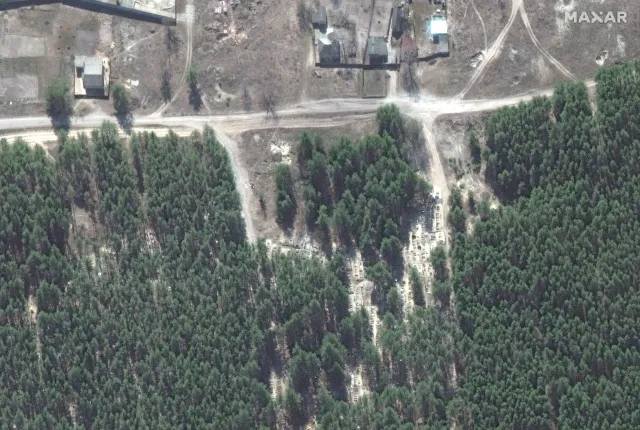 Portugalski analityk wojskowy: Zdjęcia z Iziumu przypominają masakrę w Katyniu