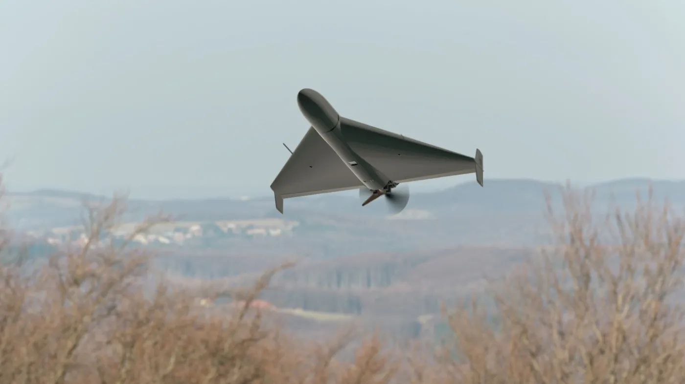 Military,Kamikaze,Drone,Flies,Over,Forest,And,Hills