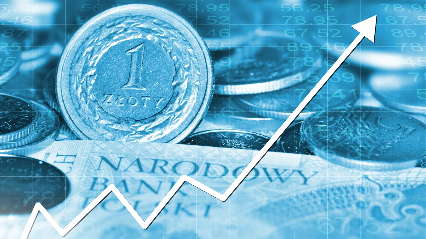 moneta na tle wykresu